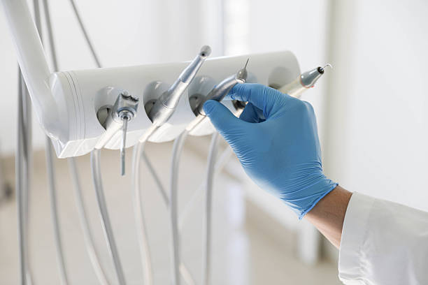 Professional Tooth Extraction technician working in Gilbert, IA